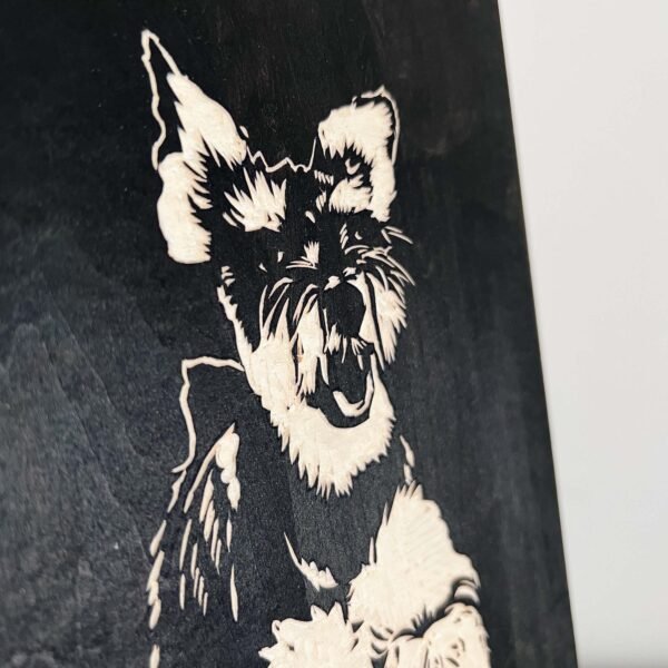 Custom Wooden Engraved Pet Portrait – Handmade, Eco-Friendly Memorial Gift Description: A detailed handmade wooden pet portrait showcasing a small, fluffy dog with pointed ears and an open mouth, beautifully set against a dark background. The intricate engraving work is designed to enhance the charming features of your beloved pet.